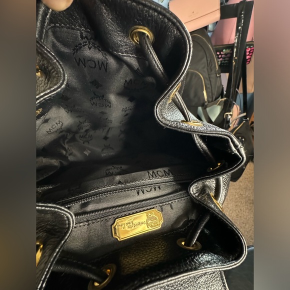 MCM Like New Studded Logo Black Pebbled Leather Backpack Tassel Drawstring - Picture 13 of 15